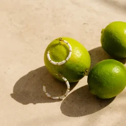 Puka Shell Hoop Studs Silber