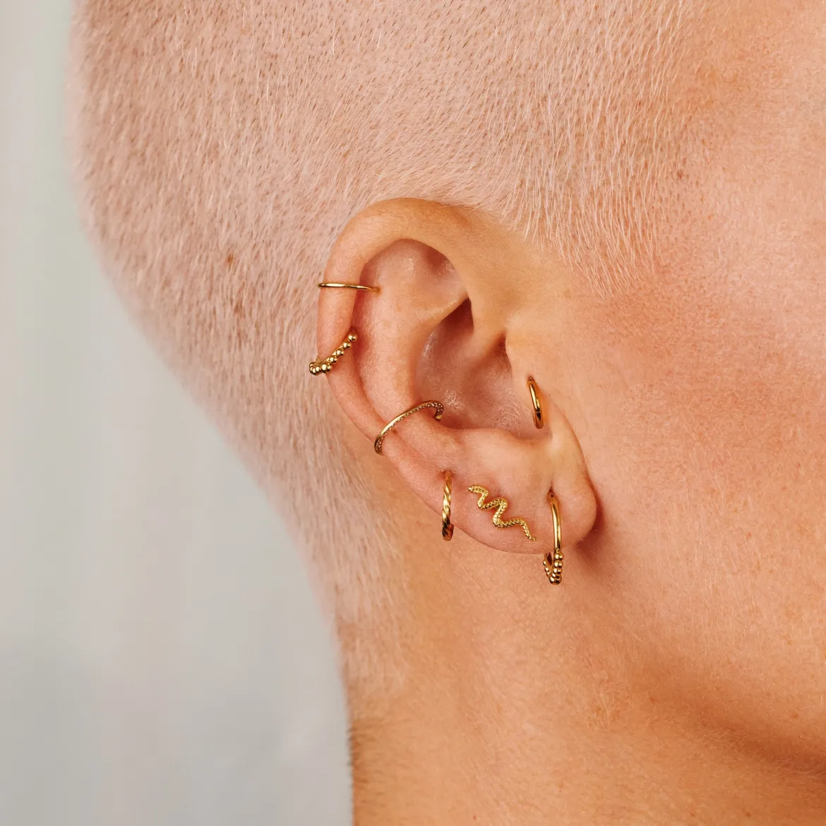 Snake Piercing Gold